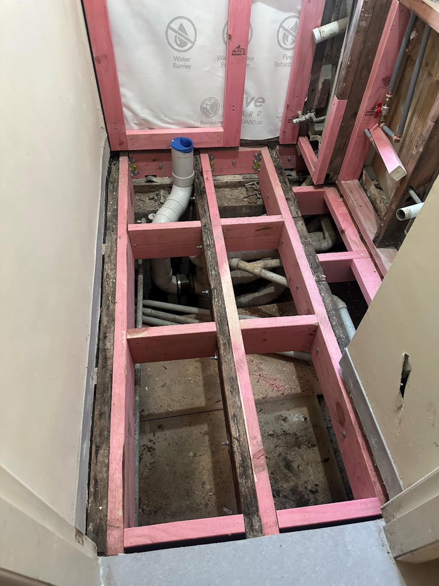 bathroom floor removed new pipes and floor joists